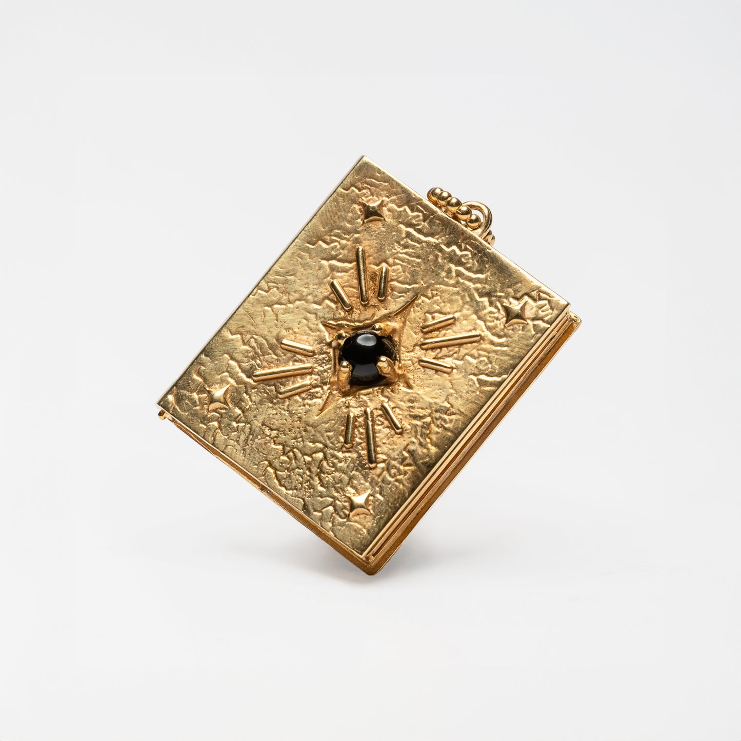 SECRET MEMORY - pendente libro porta foto in oro con pietra onice nera