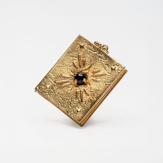 SECRET MEMORY - pendente libro porta foto in oro con pietra onice nera